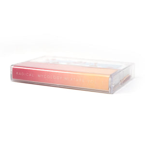 Transparent container with pink and peach-colored product inside on a white background