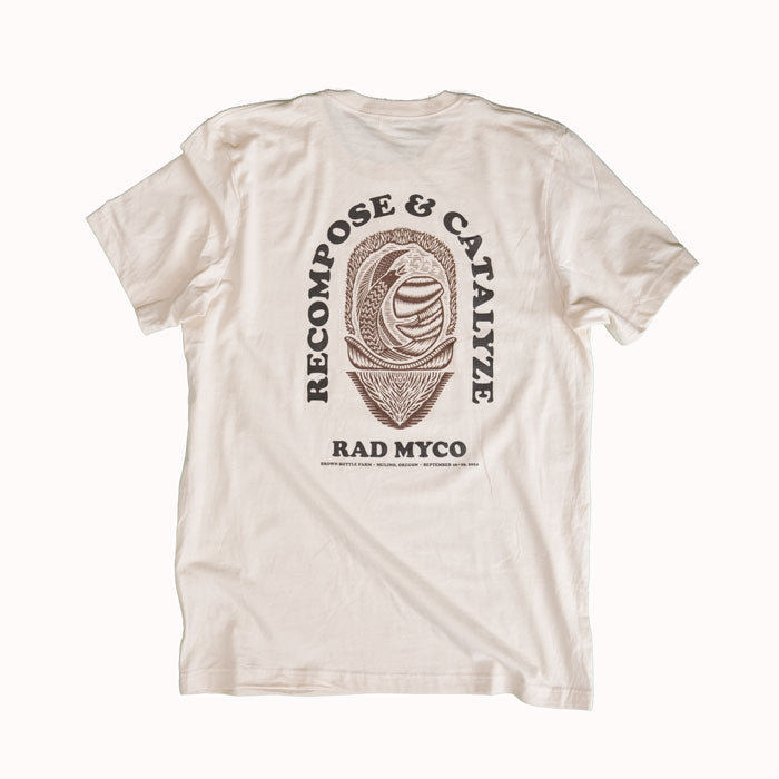 Beige t-shirt with graphic design and text on a white background