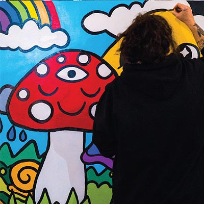 Artist painting mushroom
