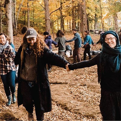 People dancing in a field