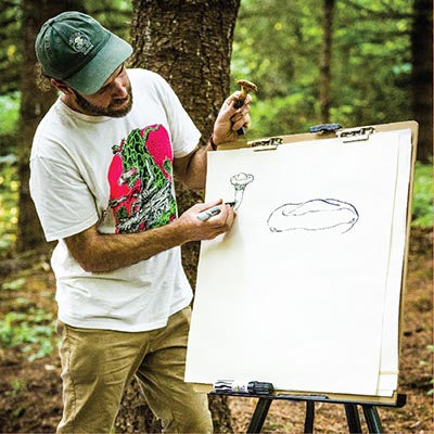 Teacher drawing mushrooms